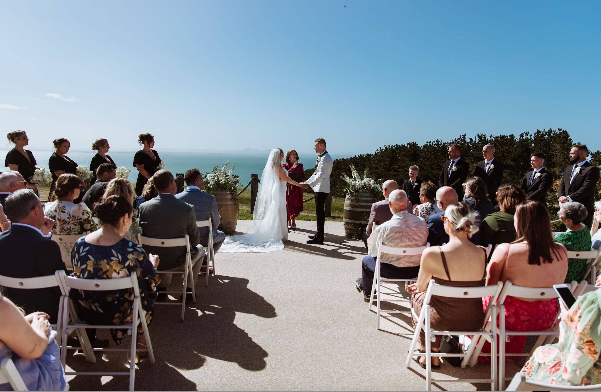 Rebecca Bode leading an outdoor wedding ceremony