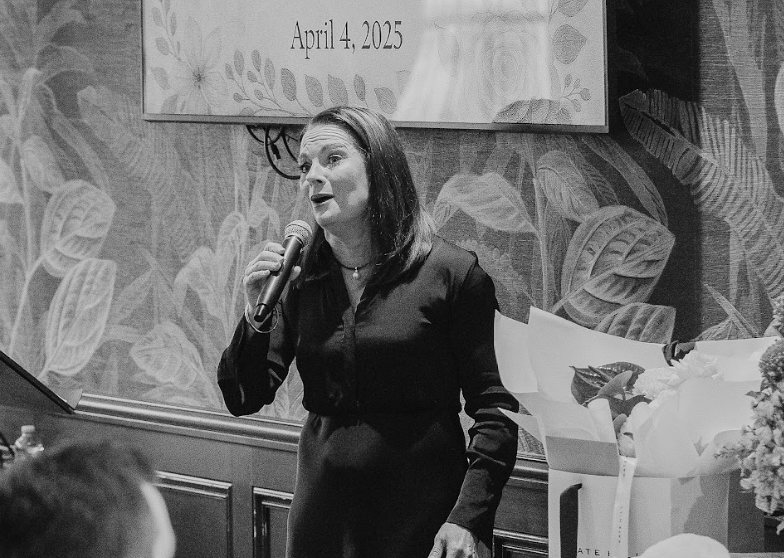 Rebecca Bode leading a funeral ceremony